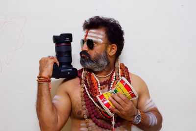 Portrait of man photographing