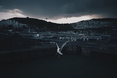 Airplane flying over cloudy sky