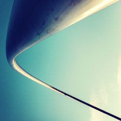 Low angle view of tree against blue sky