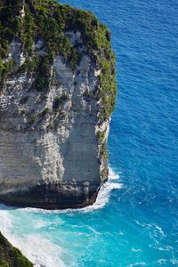 High angle view of rocks in sea