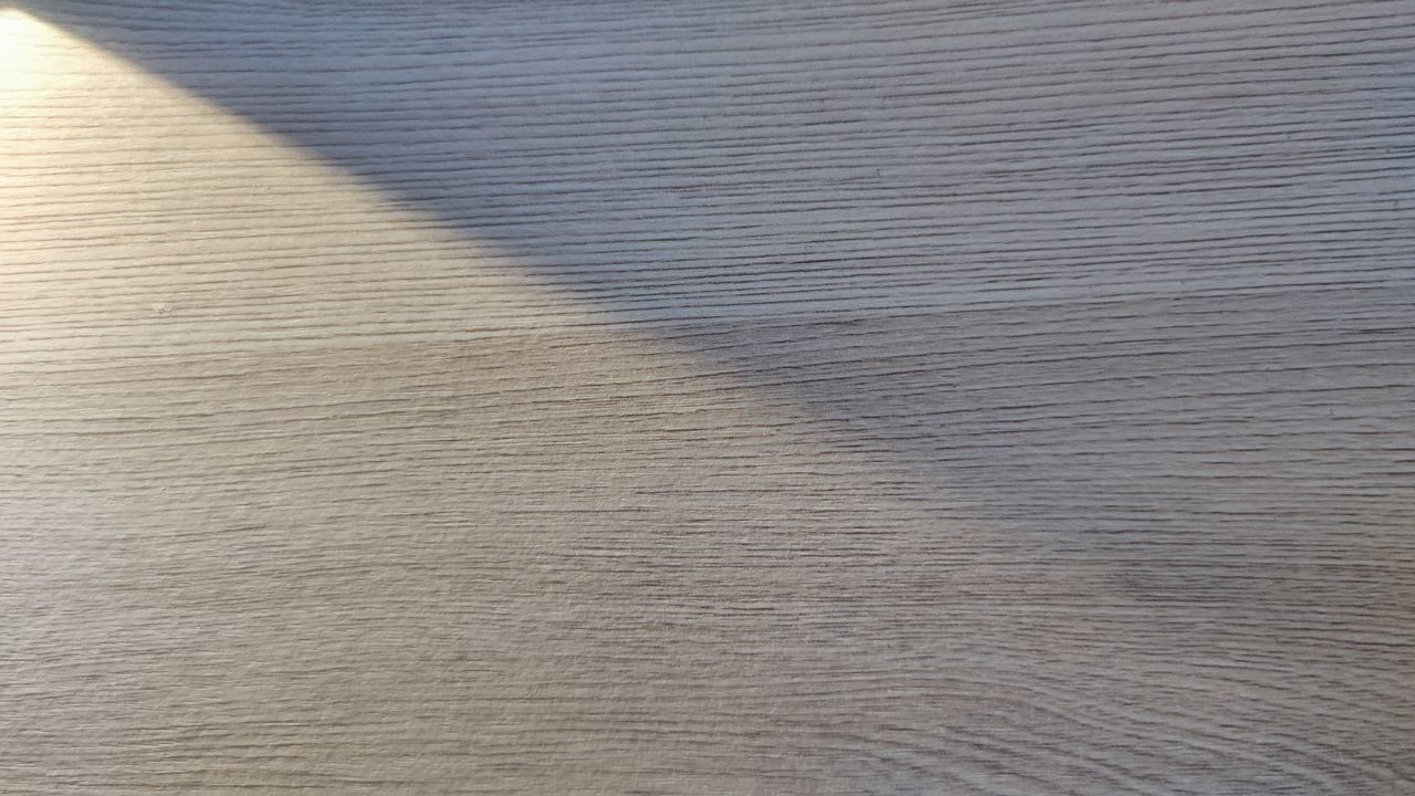 FULL FRAME SHOT OF TEXTURED WOODEN TABLE