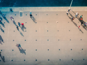 High angle view of people on floor
