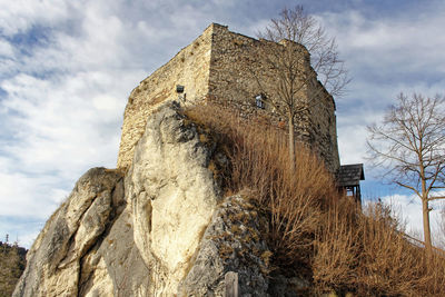 Low angle view of old building against sky