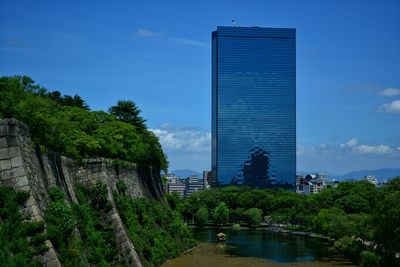 Modern buildings against blue sky