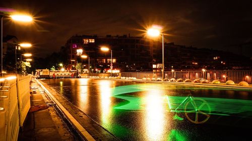 Illuminated street light at night