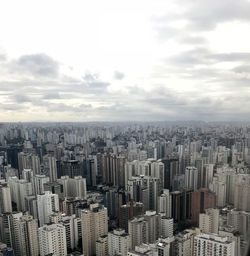 High angle view of buildings against sky in city