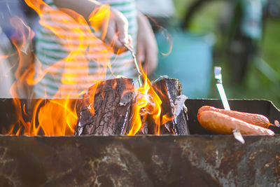 Close-up of bonfire on barbecue grill