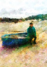 Full length of woman standing on rock