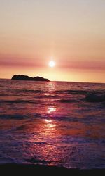 Scenic view of sea at sunset