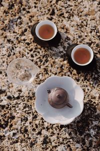 High angle view of coffee cup on table