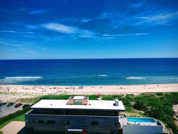 High angle view of beach against blue sky