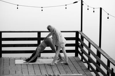 Low section of woman walking on steps