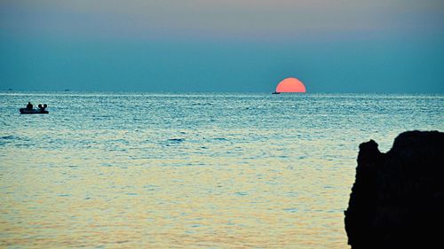 Scenic view of sea against clear sky