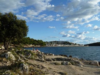 Scenic view of beach and sea against sky