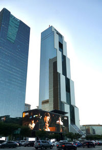 Low angle view of modern buildings against clear sky