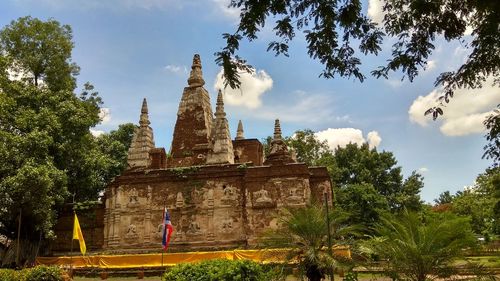 Panoramic view of temple and building against sky