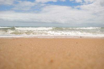 Scenic view of beach against sky
