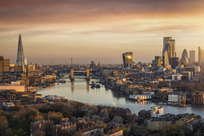 High angle view of city buildings during sunset