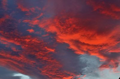 Low angle view of dramatic sky during sunset