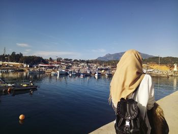 Rear view of woman looking at sea