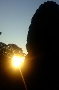 Sun shining through clouds