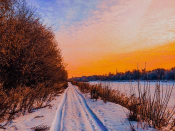Scenic view of landscape against sky during sunset
