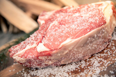 Italian steak ready to be cooked on a barbeque. appetizing piece of meat ready to be set on bbq fire