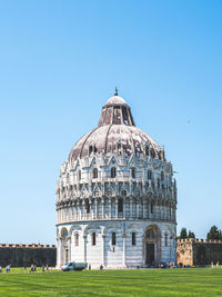 View of temple against clear blue sky