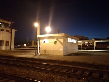 Railroad station platform at night