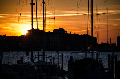 Silhouette of marina at sunset
