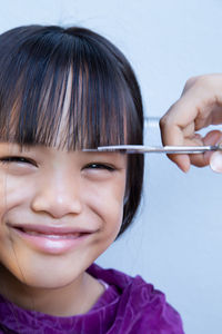 Close-up portrait of a smiling girl