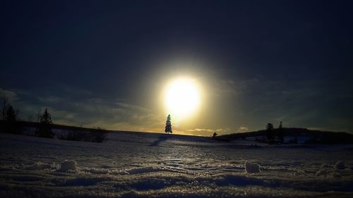 Scenic view of beach against sky during sunset
