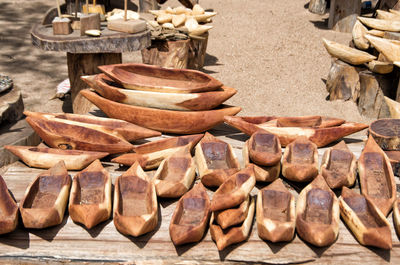 Wooden decorations for sale at market stall