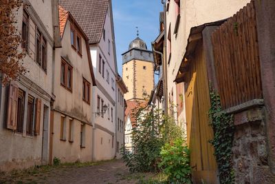 Narrow alley amidst old buildings in town