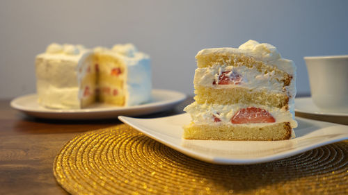 Close-up of cake served on table