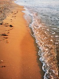 High angle view of surf on beach