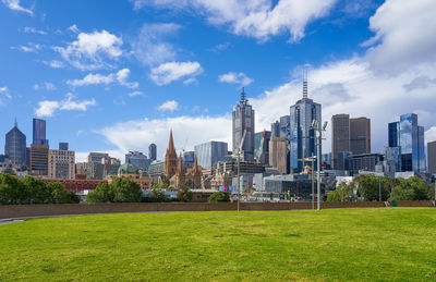 View of buildings against cloudy sky