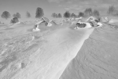 Panoramic view of landscape against sky during winter