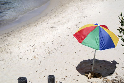 High angle view of umbrella on beach