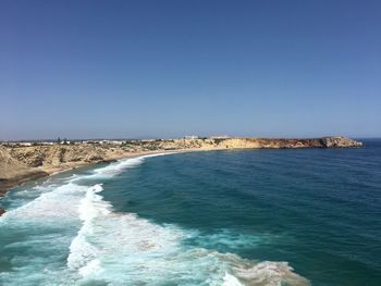 Scenic view of sea against clear sky