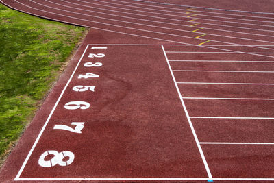 High angle view of numbers on running track