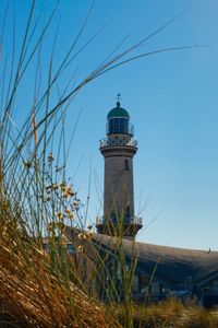 Low angle view of lighthouse against sky