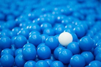 Blue plastic ball in the playground