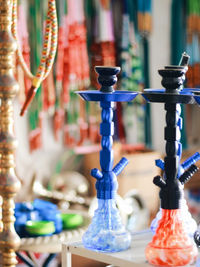 Close-up of hookah on table