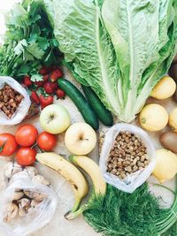 Directly above shot of various fruits and vegetables on table