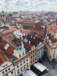 High angle view of buildings in city against sky