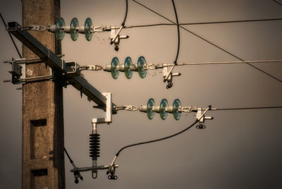 Low angle view of power lines