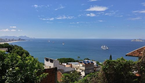 Scenic view of sea against blue sky