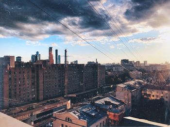 High angle view of buildings in city against sky