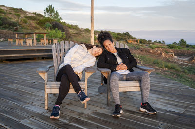 Lesbian couple spending time together outdoors.